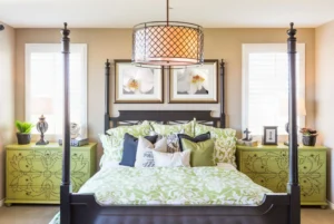 Elegant bedroom with green accents and decor.
